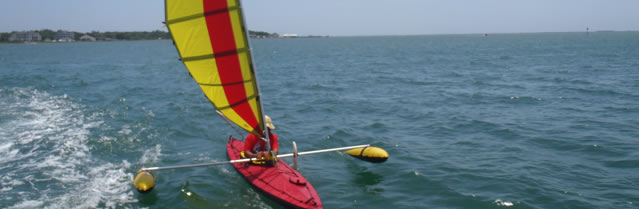 Folding kayak with BSD sailing rig and outriggers